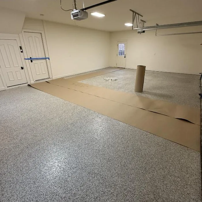Clean gray flake epoxy garage floor